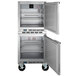 A stainless steel Beverage-Air undercounter freezer with two doors open.