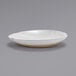 A white bowl with brown edges.