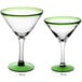 a martini glass with a green top