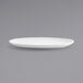 A white Front of the House porcelain oval coupe plate with a small rim.