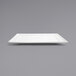 a white rectangular plate on a gray background