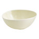 A round, vanilla bean-colored porcelain bowl with a 10 oz. capacity.