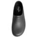 A close-up of a black Genuine Grip waterproof non-slip clog with a rubber sole.