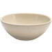 A white bowl with speckled mushroom-colored specks.