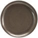 A brown porcelain plate with a black rim.