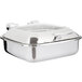 A silver metal Vollrath chafing dish with a glass lid.