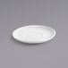 A white Front of the House Kiln porcelain saucer on a gray surface.