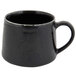 A black porcelain cup with a handle.