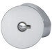 A silver metal round object with a hole in the center.