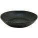 A black porcelain bowl with white specks.