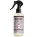 A white Mrs. Meyer's Clean Day spray bottle with a brown label and black cap.