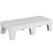 A white plastic Cambro bow tie dunnage rack.