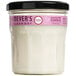 A white Mrs. Meyer's Clean Day peony scented wax candle in a jar with a black lid.