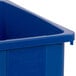 a blue plastic bin with a white background