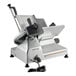 A Centerline by Hobart manual meat slicer on a table with a cord attached.