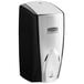 A black and white Rubbermaid Autofoam soap dispenser.