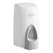 A white Rubbermaid manual foam soap dispenser with a grey plastic surface.