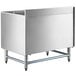 A stainless steel tub with a metal lid and a drain.