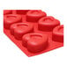 A red silicone Thunder Group heart mold with 8 heart-shaped compartments.