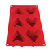 A red Thunder Group heart shaped silicone mold with 6 compartments.