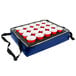 A blue Sterno insulated drink carrier holding red cups.