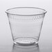 A Fabri-Kal Kal-Clear clear plastic cup on a white surface.