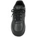 A close up of a black Genuine Grip Sport Classic shoe with laces.