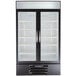 A black refrigerator with glass doors.