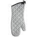 a white quilted oven mitt