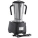An AvaMix stainless steel food blender with a black base on a counter.