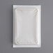A white Nordic foam brick cold pack on a white surface.