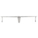 A silver metal flat strainer with hooks on a metal shelf.