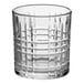 A clear glass with a textured, grid-like pattern, designed for serving rocks or old fashioned drinks.