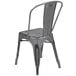 A grey metal Flash Furniture restaurant chair with a vertical slat back.