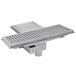 a metal drain with a metal grate