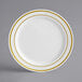 a white plate with gold lines