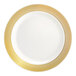A bone or ivory plastic plate with a gold lattice design around the rim.