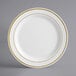 A white plastic plate with gold bands on the rim.