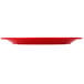 A red Carlisle Dallas Ware melamine plate with a white border.