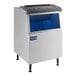 An Avantco silver ice storage bin with a blue lid.