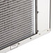 A close up of the metal grid on an Avantco air cooled ice machine.