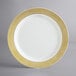 A white plate with a gold lattice design.