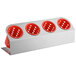 A silver rectangular Steril-Sil flatware organizer with red perforated plastic cylinders.