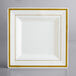 A white square Visions plastic plate with gold bands.