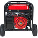 A red and black DuroStar portable generator with a wheel kit.