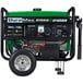 A DuroMax portable generator with a green and black cover.