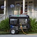 A DuroMax dual fuel generator parked on a driveway.