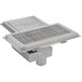 An Eagle Group stainless steel floor trough with a stainless steel grate over a square drain.