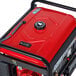 A red and black DuroStar portable generator with a wheel kit.