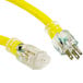 A close-up of a yellow DuroMax extension cord with two plugs.